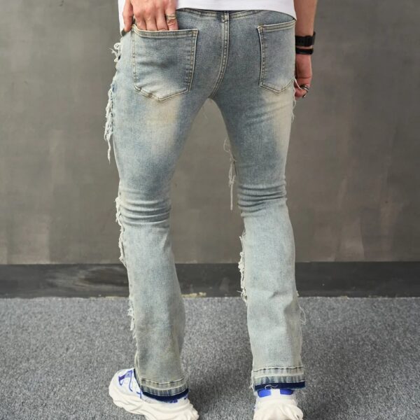 back pose stacked jeans man