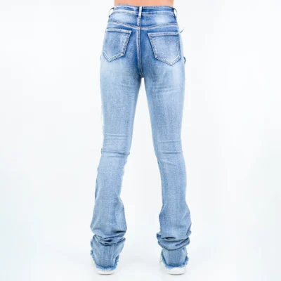 back side of stacked jeans wearing women